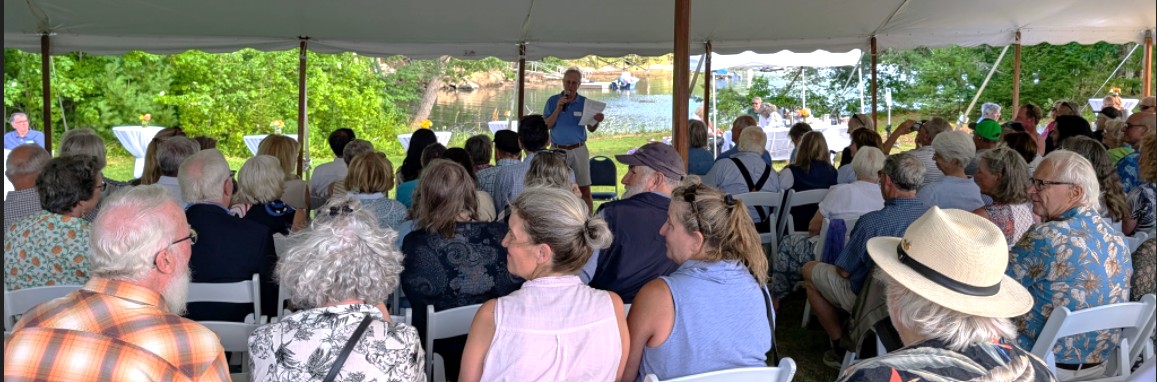 people under a tent