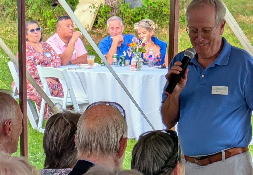 man speaking with microphone